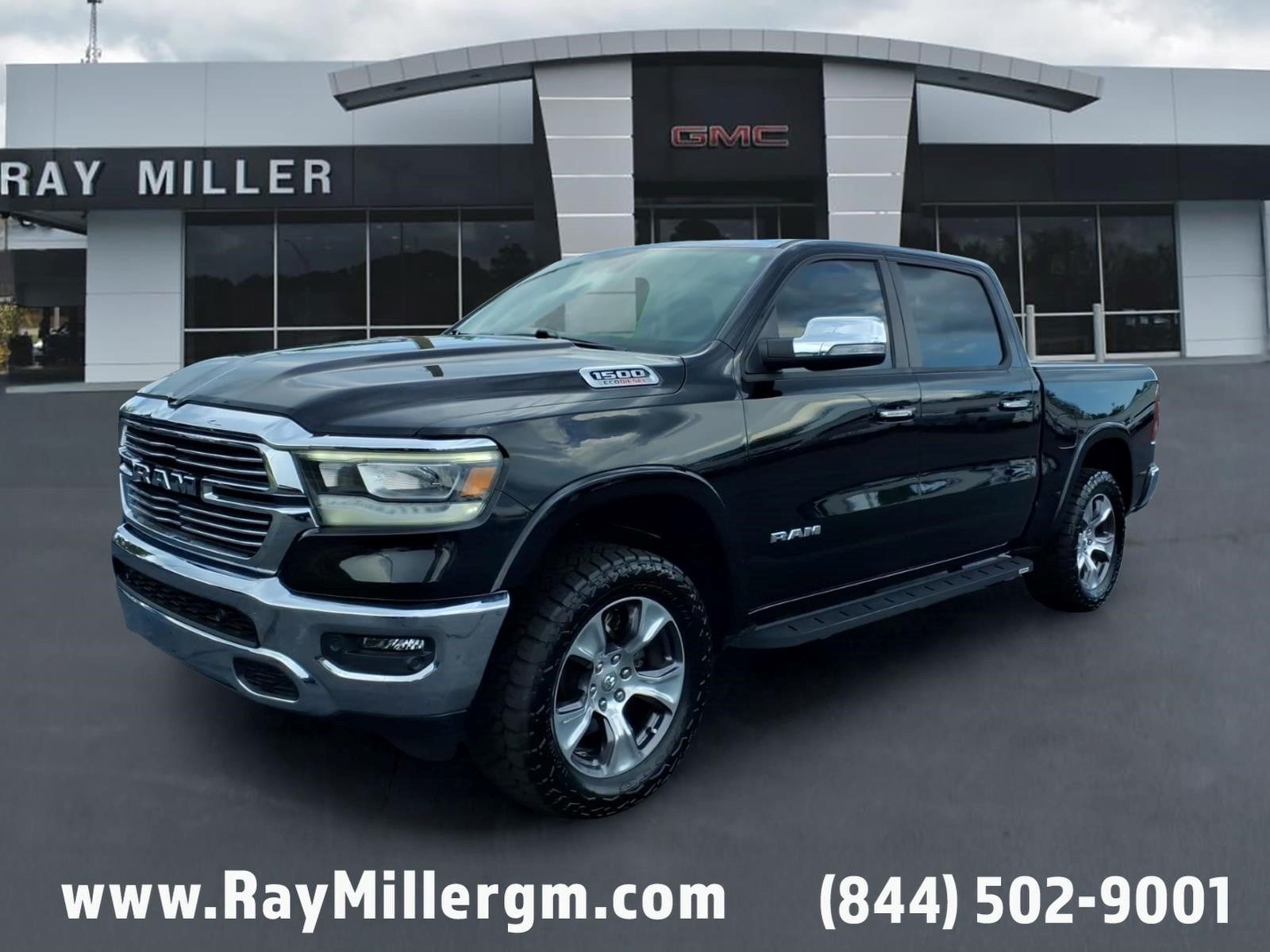 2021 RAM 1500 Laramie Crew Cab 4x4 5'7" Box in Black — front three-quarter view